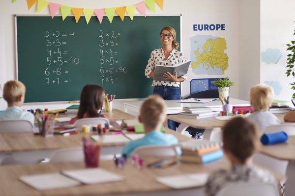 Teacher during the lesson with the kids